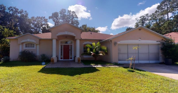 Palm Coast house with a pool for sale