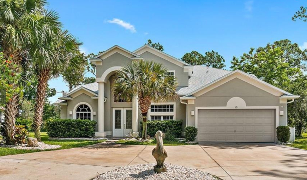 2-story house with a pool for sale in Palm Coast
